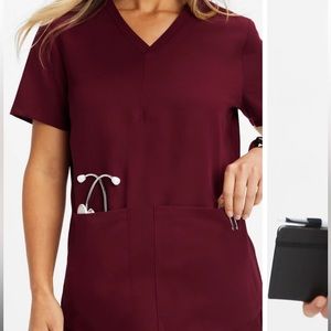 Fabletics method 2-pocket women’s scrub top in the color wine